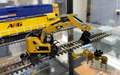 Diecast Masters CAT® 85656 CAT® M323F Railroad Wheeled Excavator Highline Series HO Scale