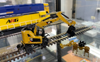 Diecast Masters CAT® 85656 CAT® M323F Railroad Wheeled Excavator Highline Series HO Scale