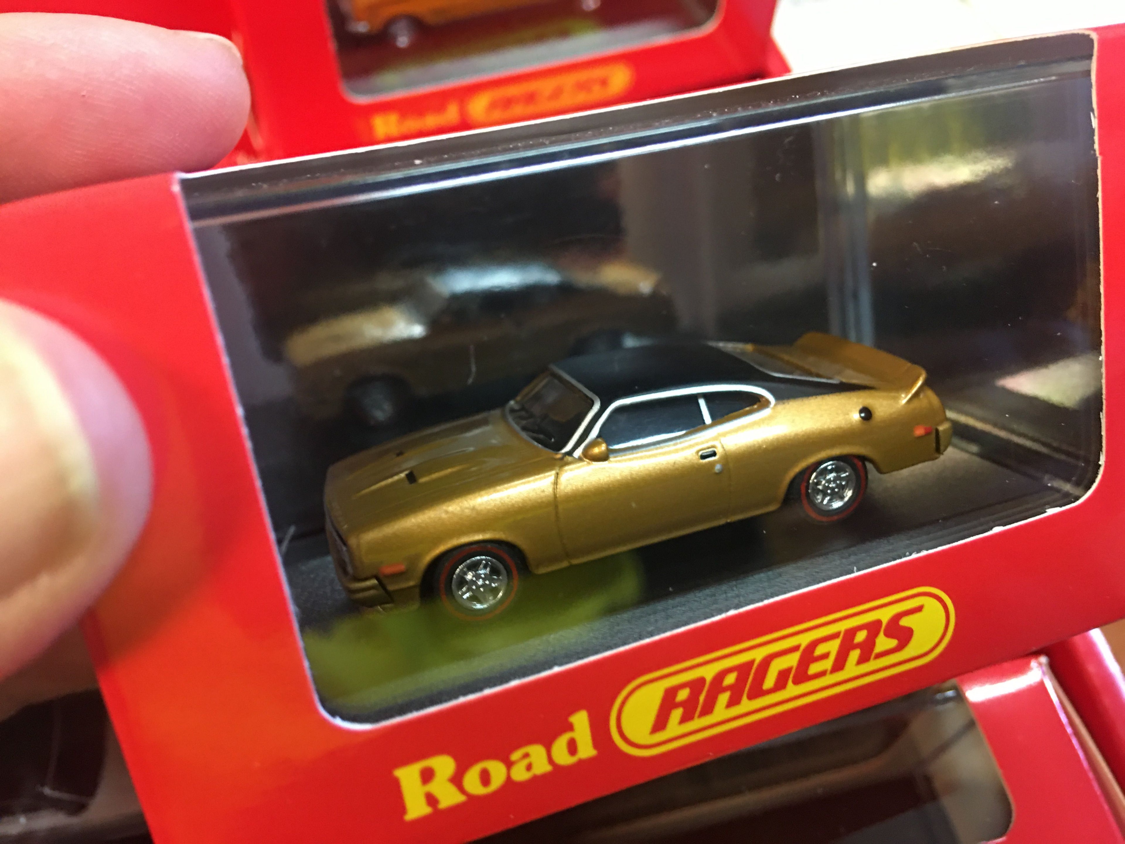 Road Ragers R.050 1979XC GS Coupe Gold Dust/Black Vinyl Roof HO Scale